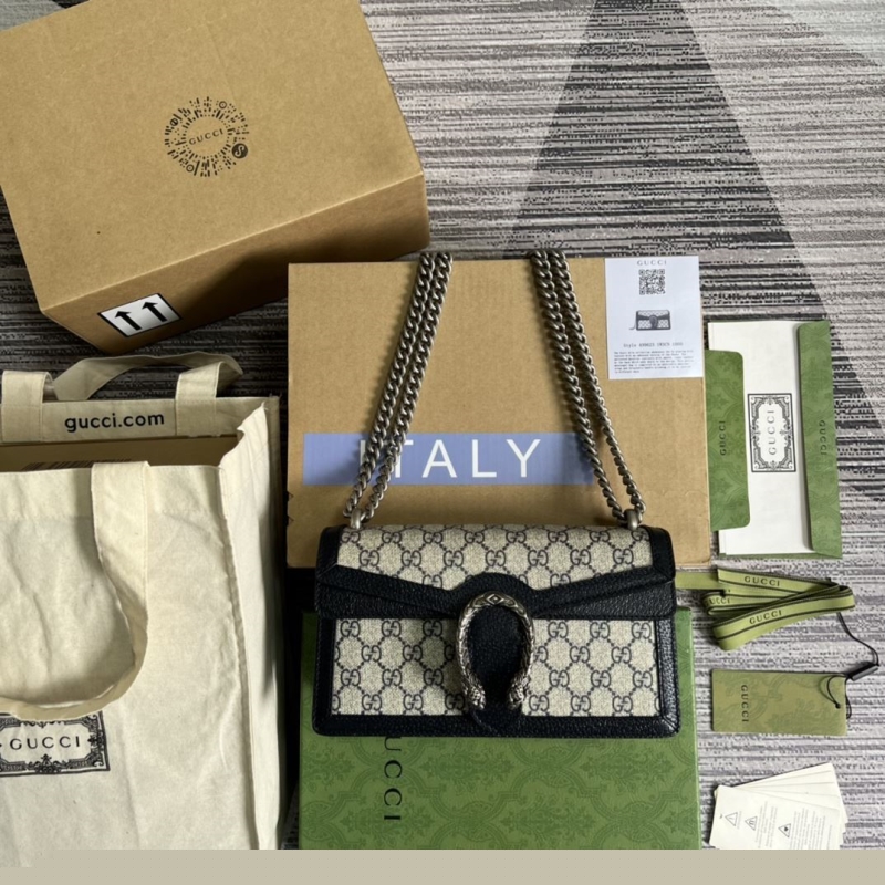 G*u*i top handle bags